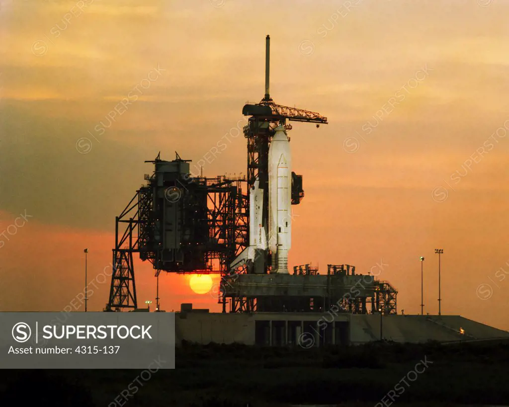 Sunset Glows Behind Space Shuttle Columbia (STS-1)