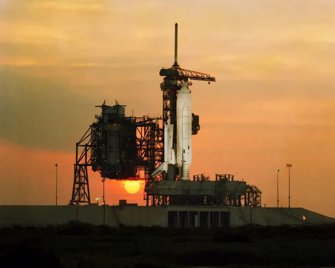 Sunset Glows Behind Space Shuttle Columbia (STS-1)