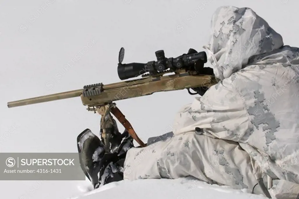 US Marine Sniper Aims an M40 Sniper Rifle During Mountain Warfare Training