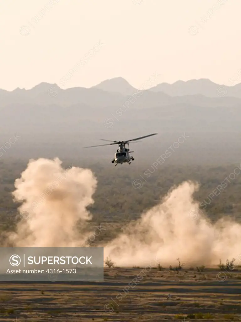 UH-1Y Attack Helicopter Flies Through Dust and Smoke