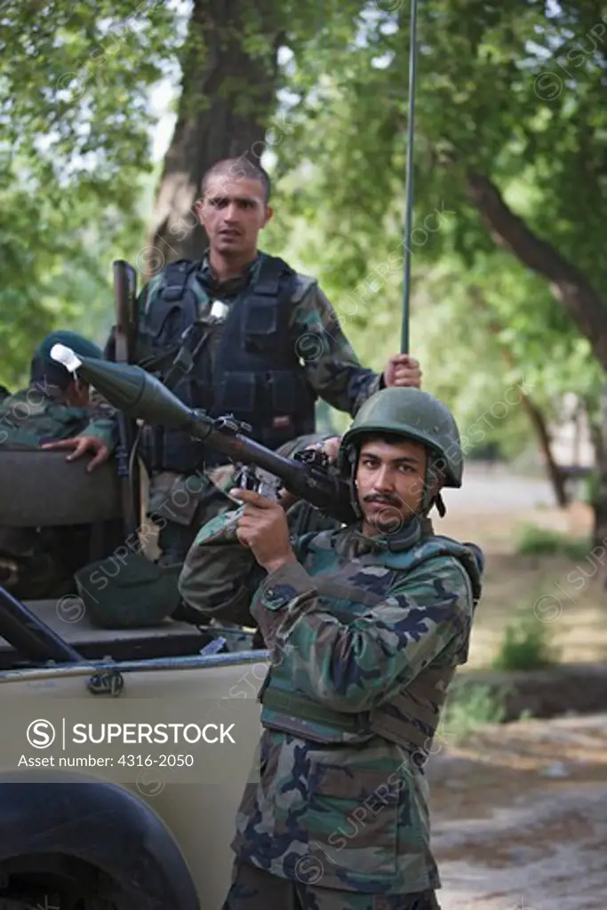 Afghan National Army Soldier Shoulders A Rocket Propelled Grenade Launcher, Jalalabad, Afghanistan