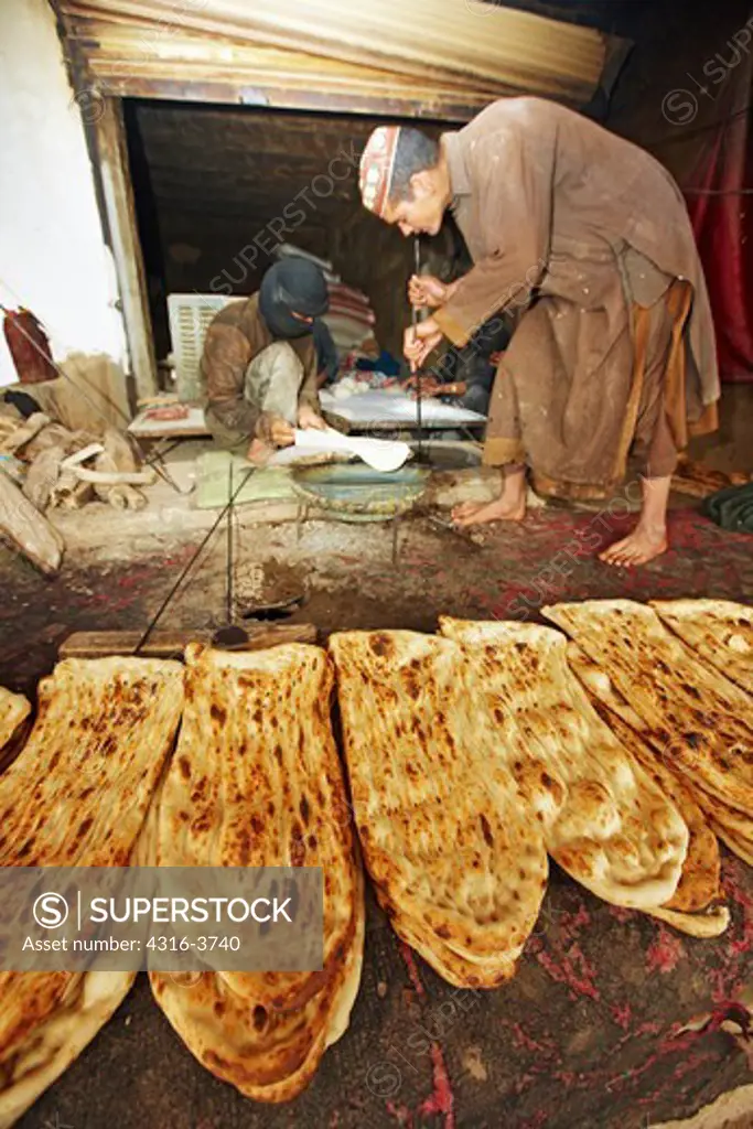 Men Making and Selling Nan Bread in Marjah, Afghanistan.