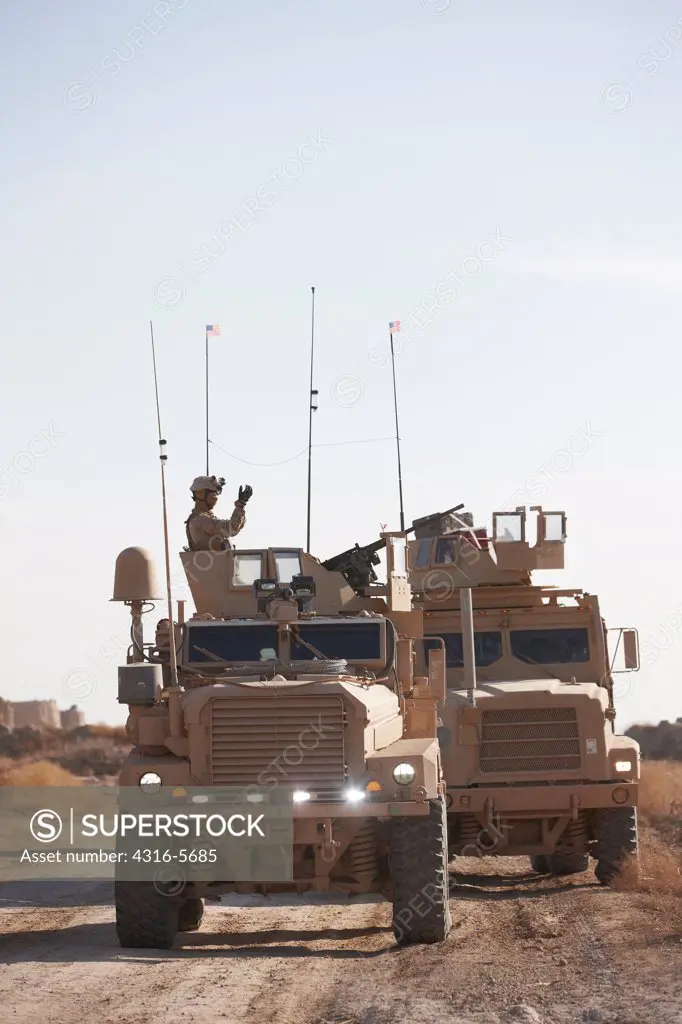 United States Marine Corps MRAP or Mine Resistant Ambush Protected Vehicle during a combat operation in the Helmand Province, Afghanistan