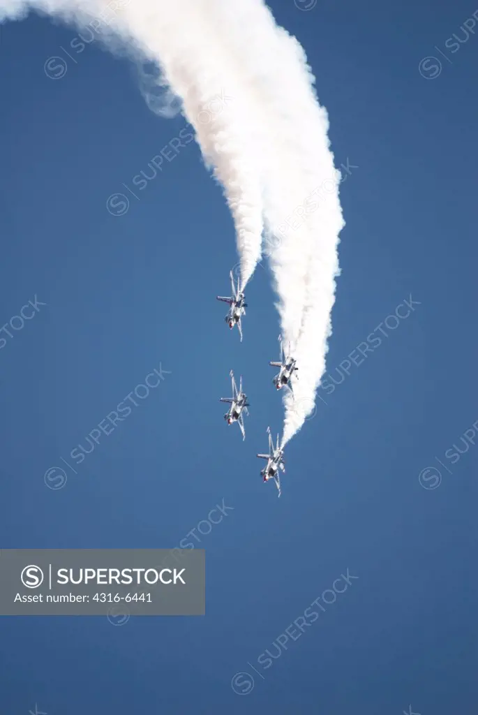 Air Force Thunderbirds in formation during an air show