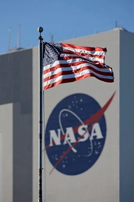 The American flag flies below the Vehicle Assembly Building, Kennedy Space Center, Florida.