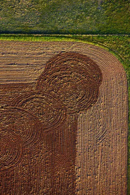 An aerial view of farm land, with circular plow lines, on the eastern Colorado Plains.