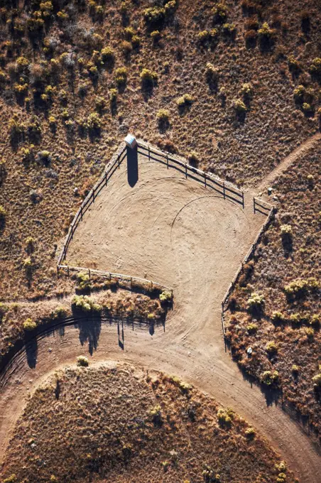 USA, Colorado, San Luis Valley, Aerial view of dirt road, parking lot, and portable toilet in Great Sand Dunes National Park