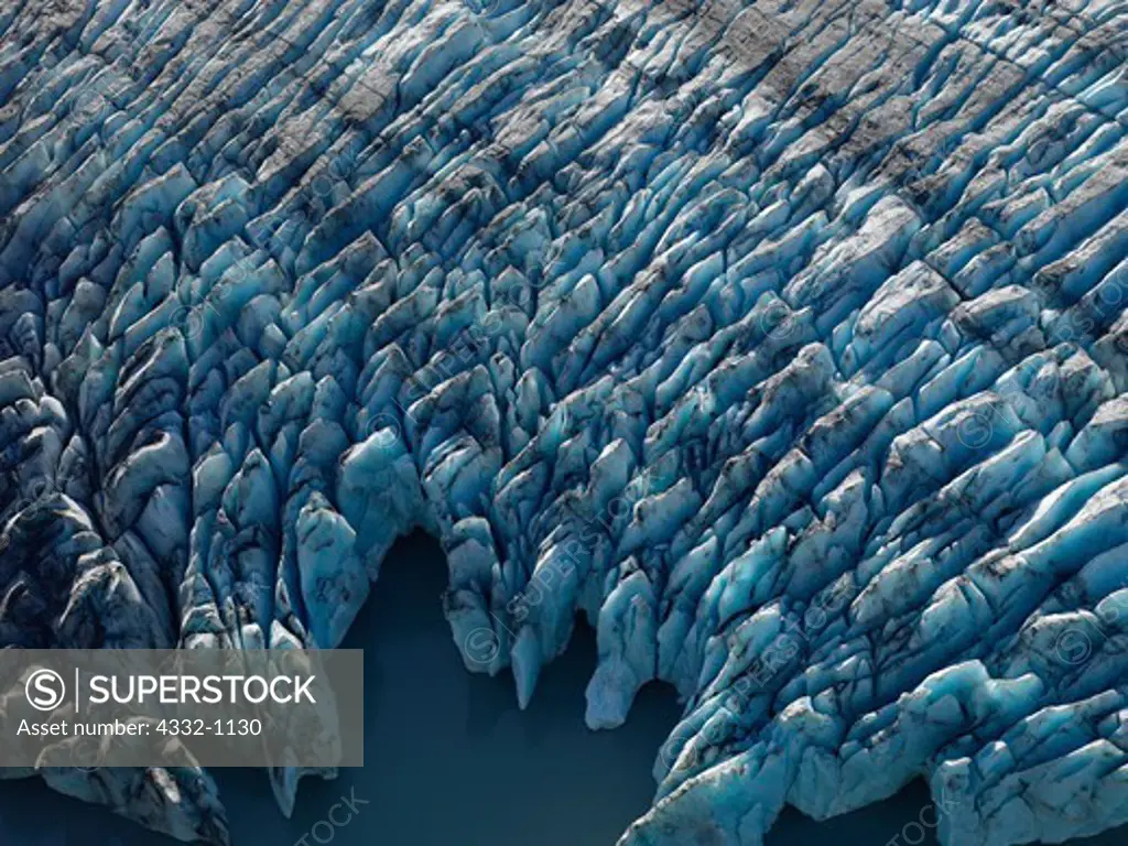 Aerial view of crevasses and seracs at the face of Colony Glacier, Lake George, Alaska.