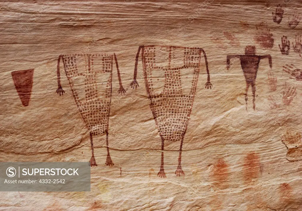 Anthropomorphic pictographs painted with finger tips with heads missing due to different pigment being used that has eroded away, Green Mask Spring Site, Tributary to Grand Gulch, Utah.