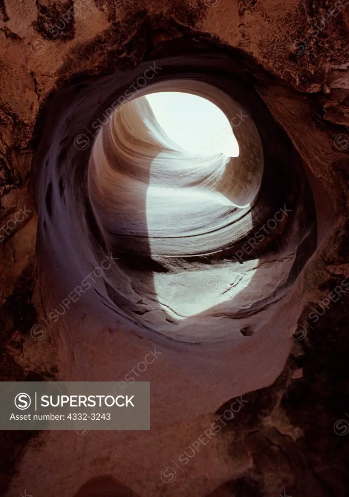 Pothole arch created by natural drain, Stone Donkey Canyon, Grand Staircase-Escalante National Monument, Utah.