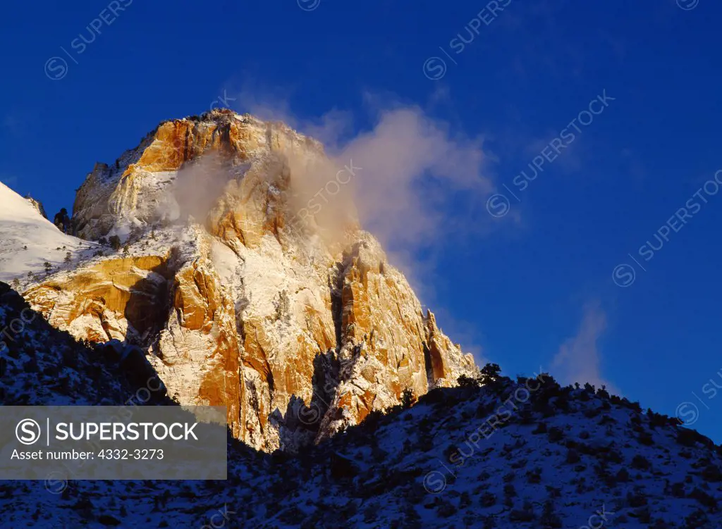 Sunrise on the Sentinel following a winter storm, Zion National Park, Utah.