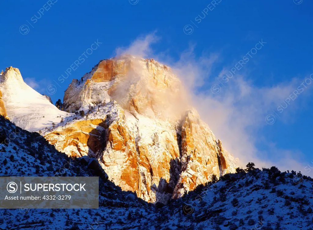 Sunrise on the Sentinel following a winter storm, Zion National Park, Utah.