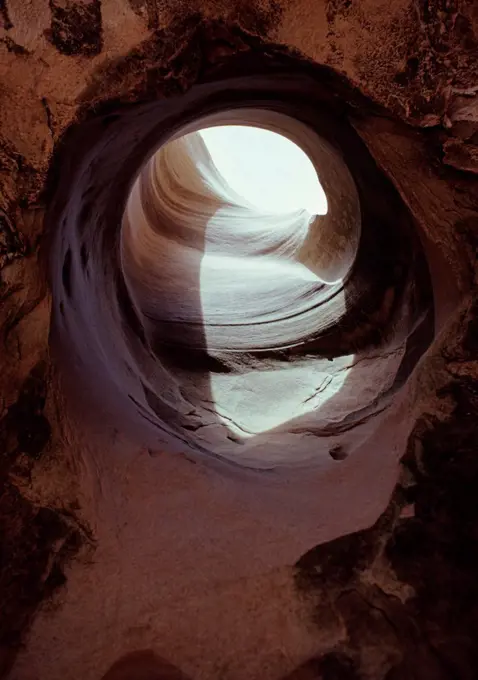 Pothole arch created by natural drain, Stone Donkey Canyon, Grand Staircase-Escalante National Monument, Utah.