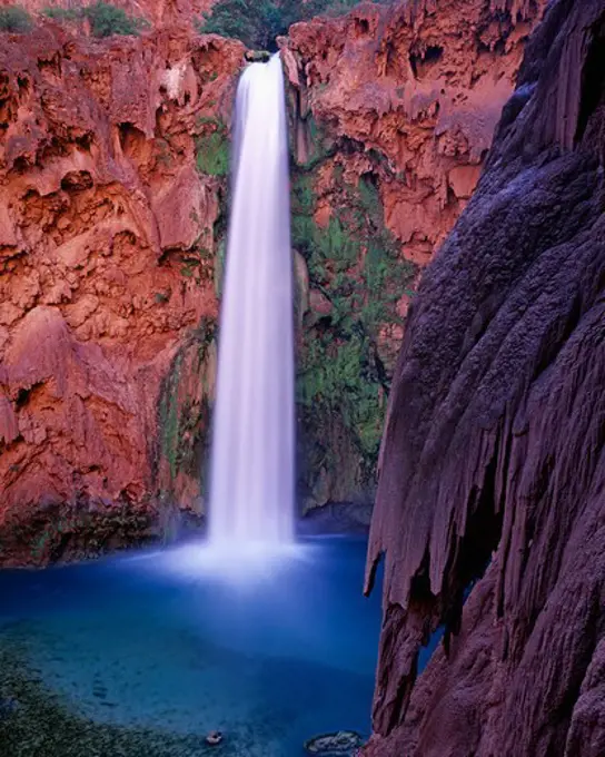 USA, Arizona, Havasupai Reservation, Grand Canyon, Havasu Canyon, Mooney Falls with surrounding travertine formations