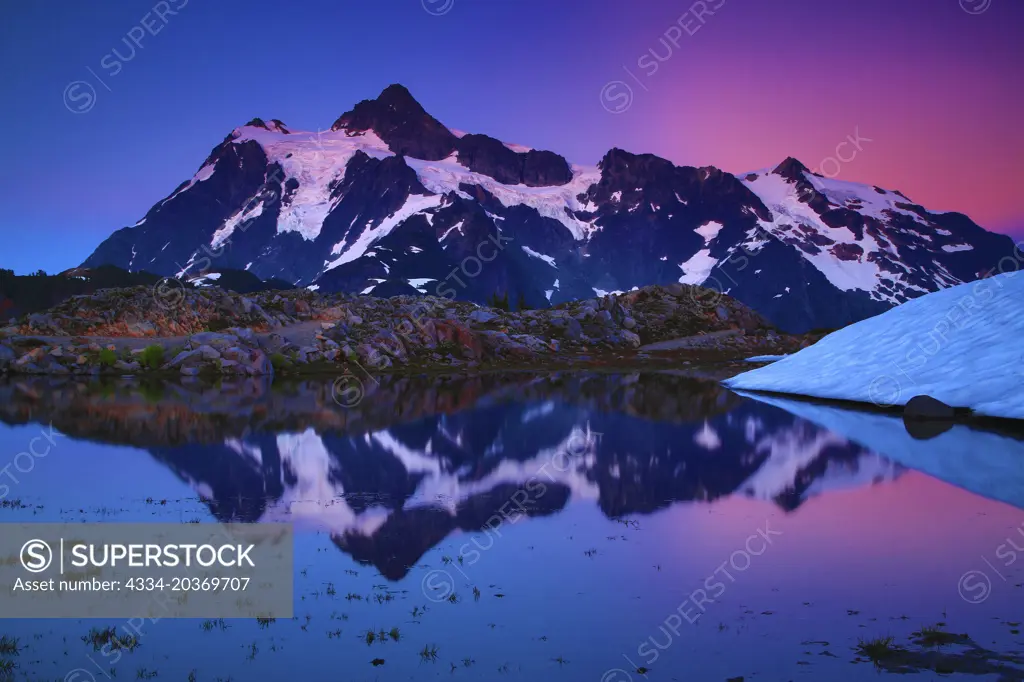 AfterGlow On Mt Shuksan Reflected In A Tarn From Artists Ridge in The Mt Baker National Recreation Area Of Washington