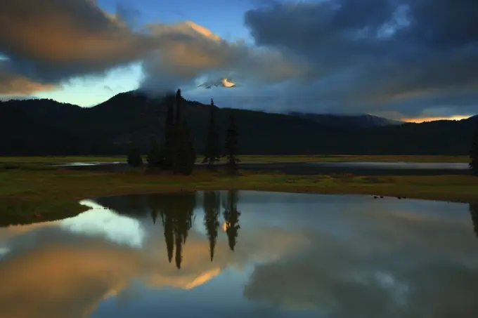 Sunset From Sparks Lake With the South Sister Trying To Break Out of the Clouds in The Deschuttes National Forest in Oregon