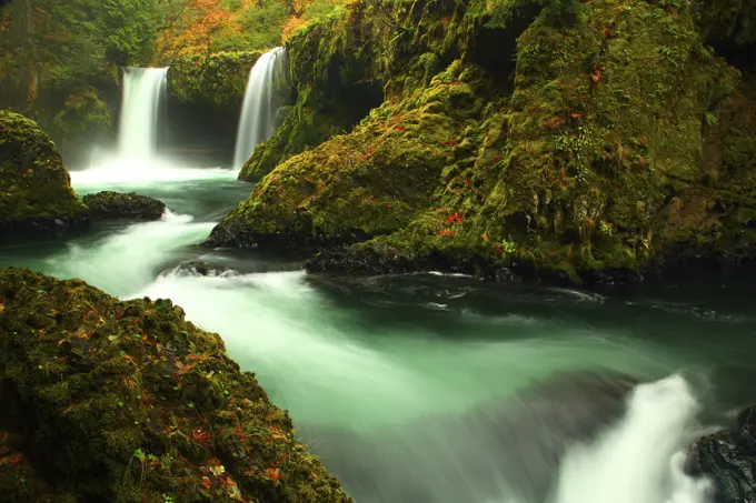 Fall Color Over Spirit Falls Along the Little White Salmon River in The Columbia River Gorge in Washington