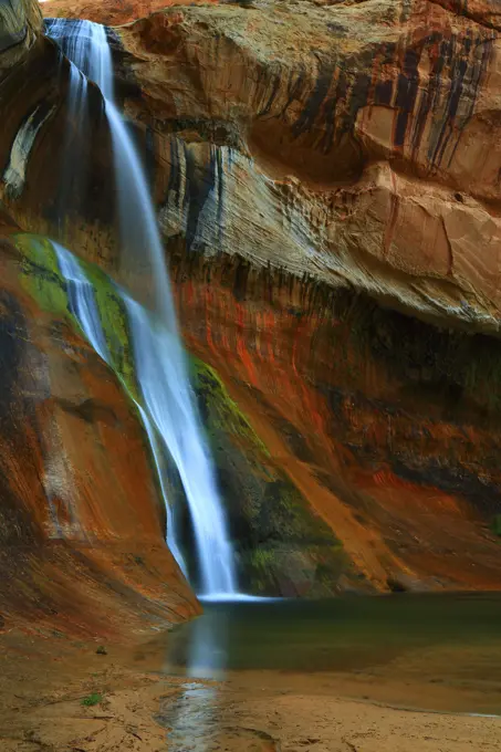 Calf Creek Falls Pours Over Sand Stone Cliffs to Plung into an Idyllic Pool From Calf Creek Falls State Park in Escalante in Utah