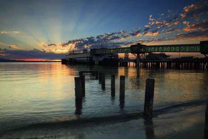 Sunset Edmonds Ferry at Dock From Edmonds Beach in Edmonds Washington