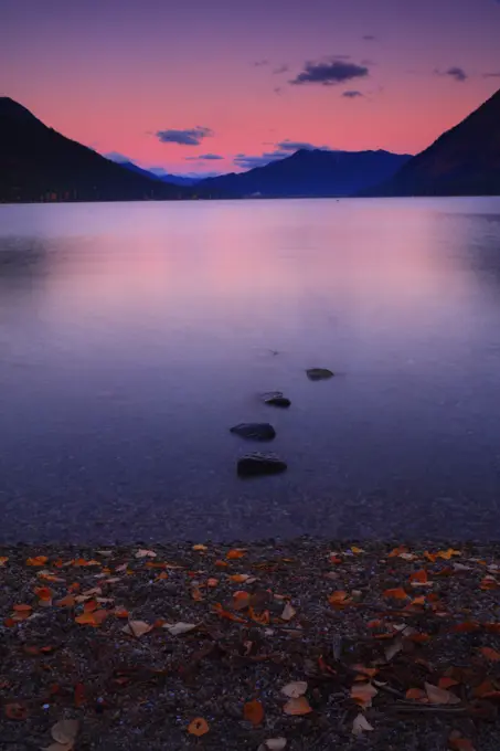 A Fall Sunrise Alpenglow Over Lake Wenachee From Lake Wenatchee Beach in Lake Wenatchee State Park in Washington