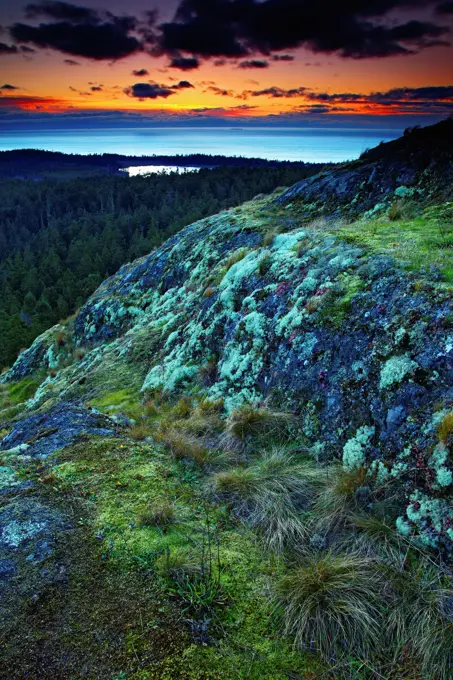 Sunset from Goose Rock, on Whidbey Island, Deception Pass State Park, Washington. Part of Cranberry Lake can be seen, and the Puget Sound.