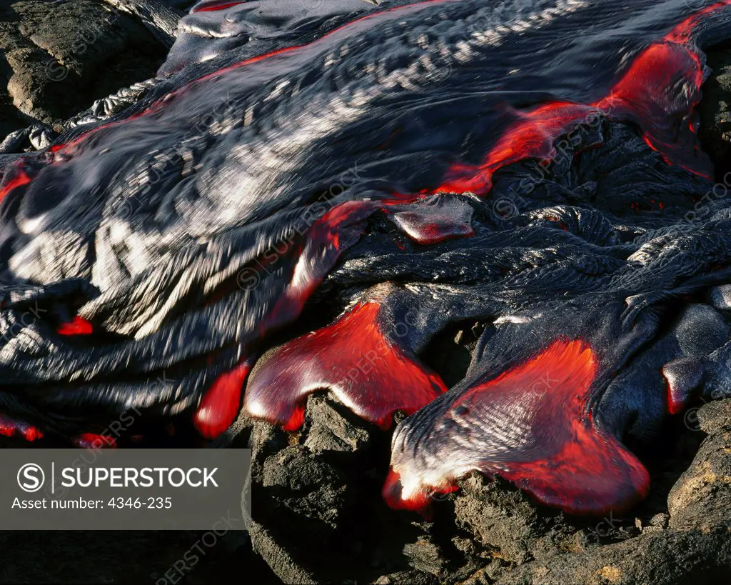 Hot Pahoehoe Lava Flows Relentlessly Downhill