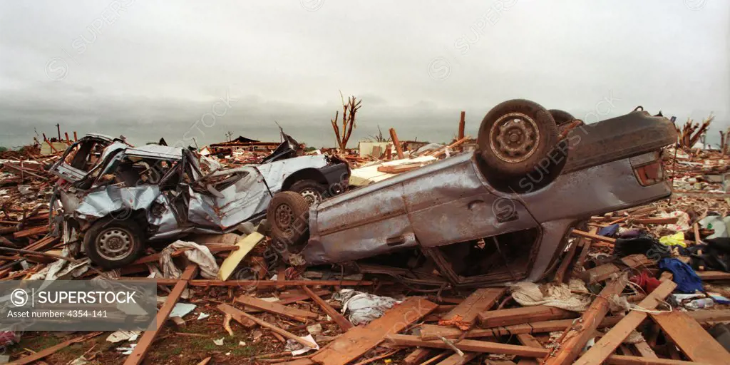 Debris and Vehicles Lie Scattered After an F5 Tornado