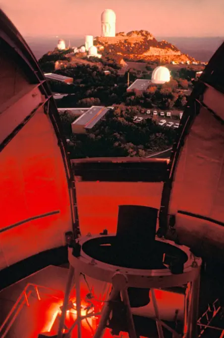 A view from the 2.1 meter telescope at Kitt Peak National Observatory  at dawn, looking north toward the Mayall 4-meter telescope on the highest hill.