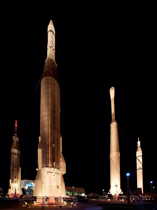 The Rocket Garden at the Kennedy Space Center Visitor Complex at night. On display are (l-r) a Mercury Atlas, Atlas Agena, Delta, and Juno I.