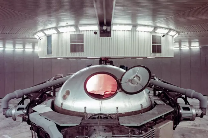 A view of the now-defunct centrifuge at the Manned Spacecraft Center (MSC), now the Johnson Space Center (JSC) formerly located in the Flight Acceleration Facility, bldg 29. The 50-foot arm can swing the three man gondola to create g-forces astronauts would experience during controlled flight and during reentry. The centrifuge was designed primarily for training Apollo astronauts.