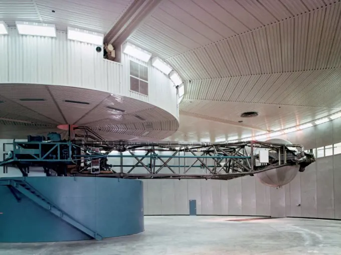 View of the now-defunct centrifuge at the Manned Spacecraft Center (MSC), now the Johnson Space Center (JSC) formerly located in the Flight Acceleration Facility, bldg 29. The 50-ft. arm can swing the three man gondola to create g-forces astronauts will experience during controlled flight and during reentry. The centrifuge was designed primarily for training Apollo astronauts.