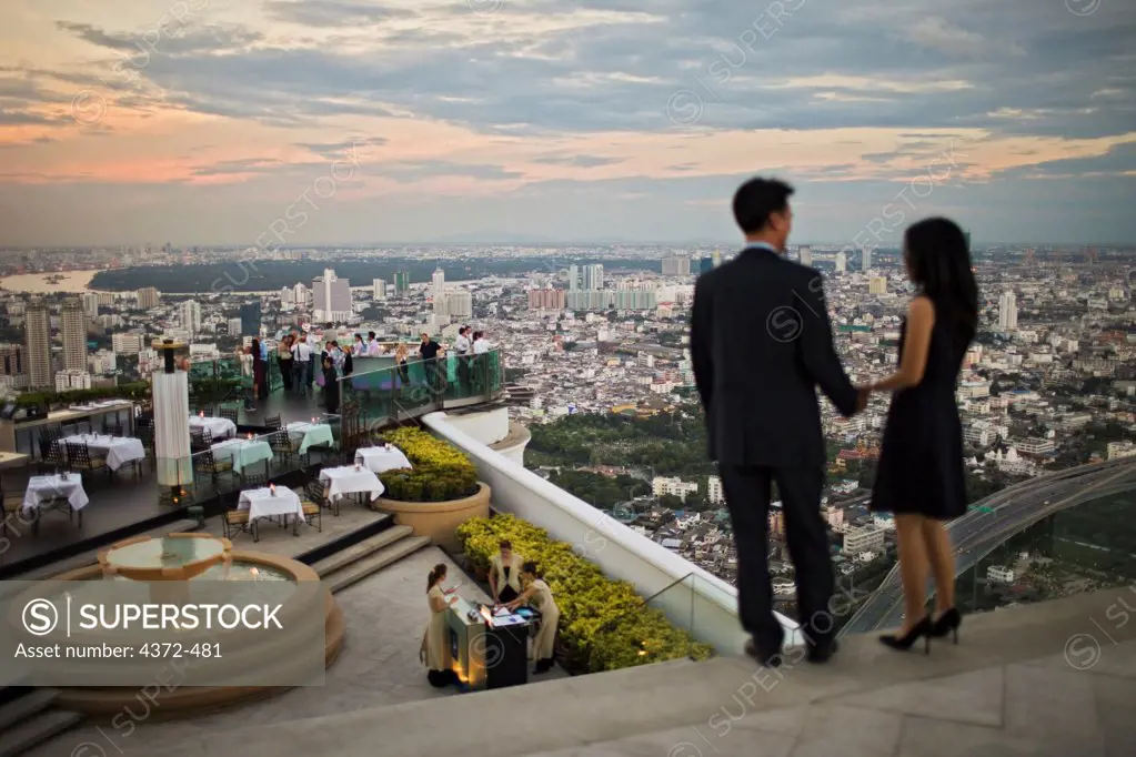 The Sirocco Sky Bar atop Lebua at State Tower, on Silom Road, Bangkok, Thailand, high above the city.