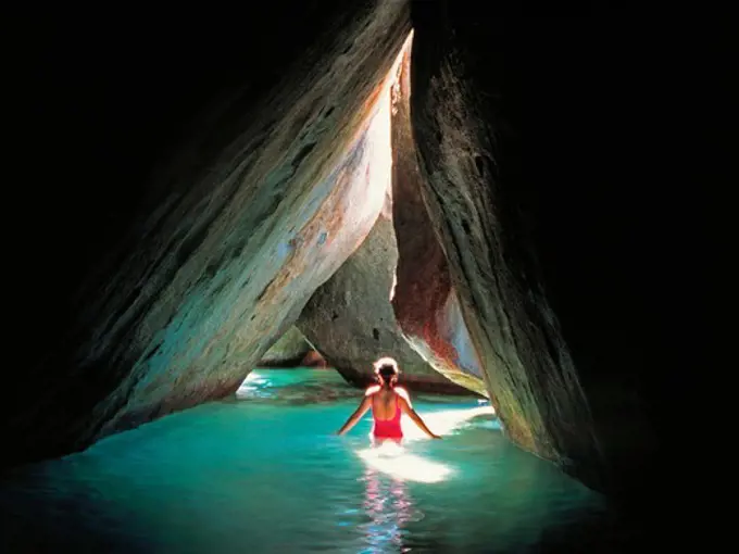 Woman Framed in Granite Rock at the Baths