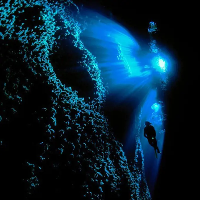 Diver in a Crack in a Coral Island