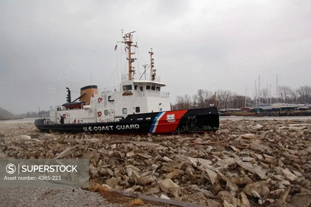 The Coast Guard Cutter 'Neah Bay' conducts ice breaking operations along the Grand River to mitigate flooding for communties in the Grand River, in the Ohio area.  The Coast Guard provides support to the U.S. Army Corps of Engineers for the mission to reduce flood and storm damage.  (U.S. Coast Guard/Photo by Petty Officer Third Class Jacob Haslem)