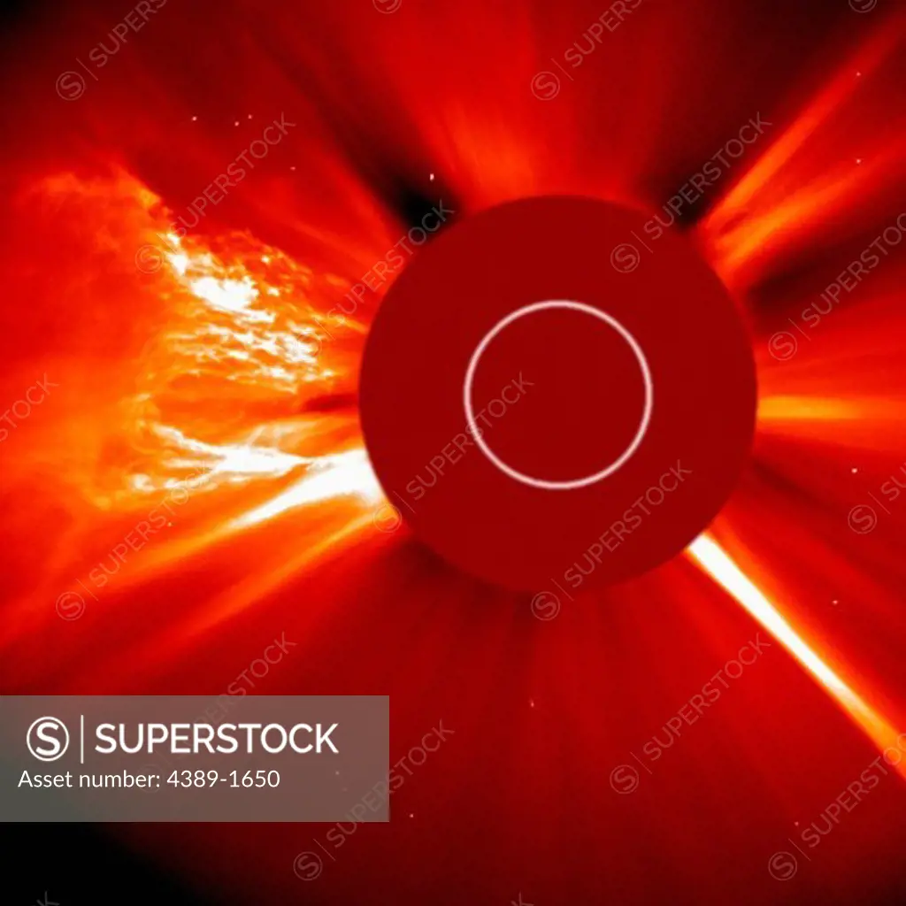 The C2 coronagraph of the Solar and Heliospheric Observatory (SOHO) captured this image of a very large coronal mass ejection and solar flare in the area of former sunspot region 798. The flare was the fifth largest ever recorded. The white circle represents the position and size of the Sun.