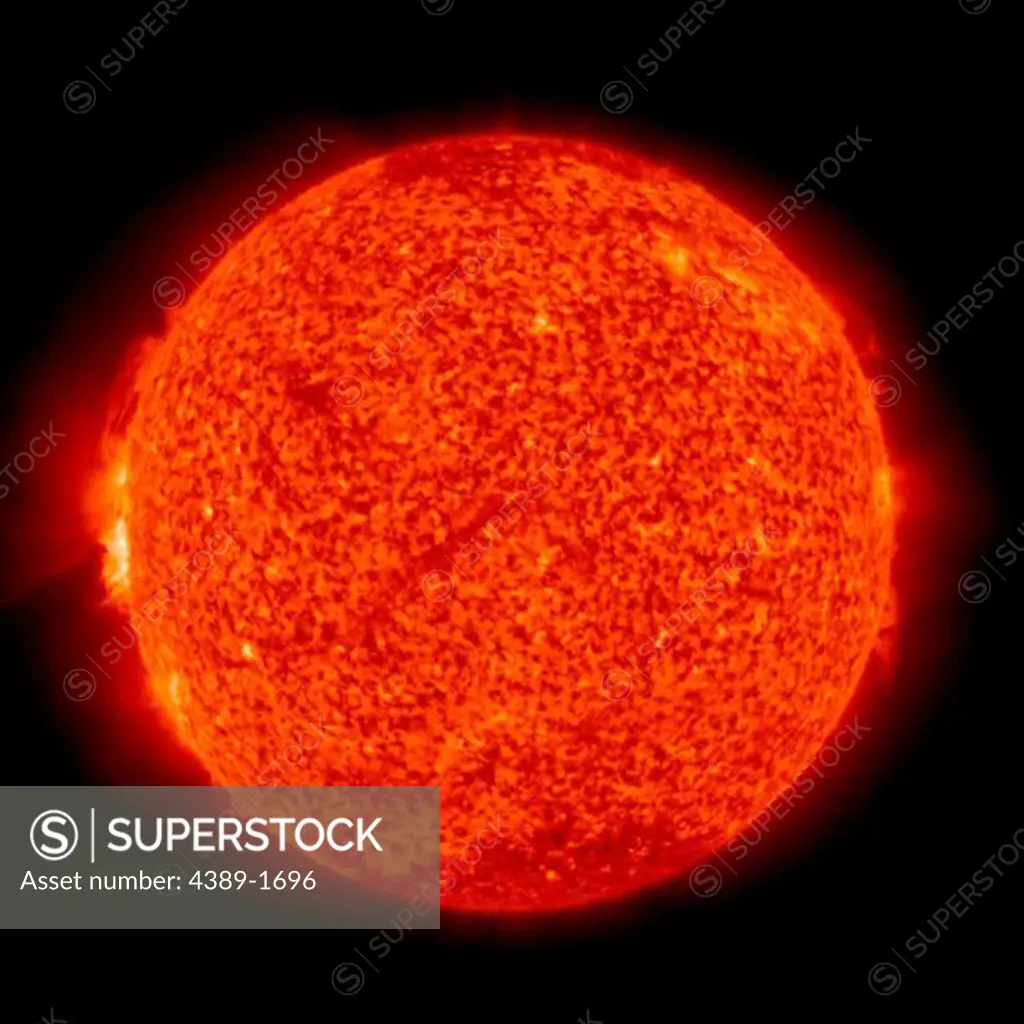 A view of a fairly normal Sun, with solar prominences on the edge, seen in the Solar and Heliospheric Observatory (SOHO)'s Extreme ultraviolet Imaging Telescope (EIT) 304 Angstrom instrument.