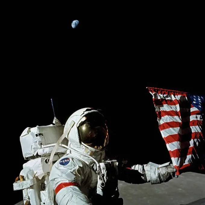 An Apollo 17 Astronaut Stands Near an American Flag as the Earth Hangs Overhead