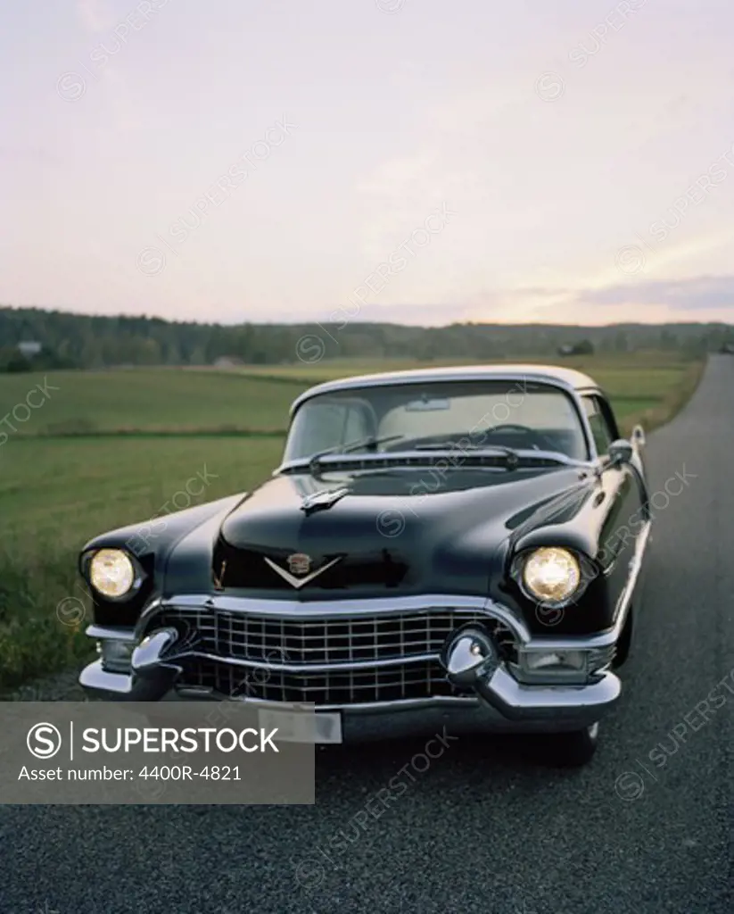 Vintage car on rural road