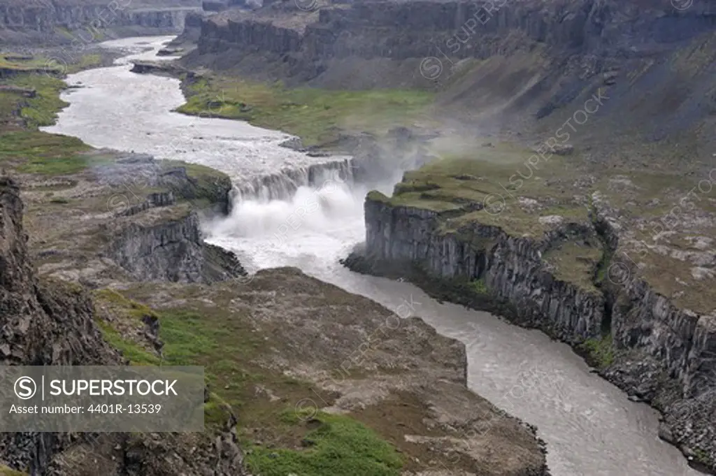 View of waterfall with ravine