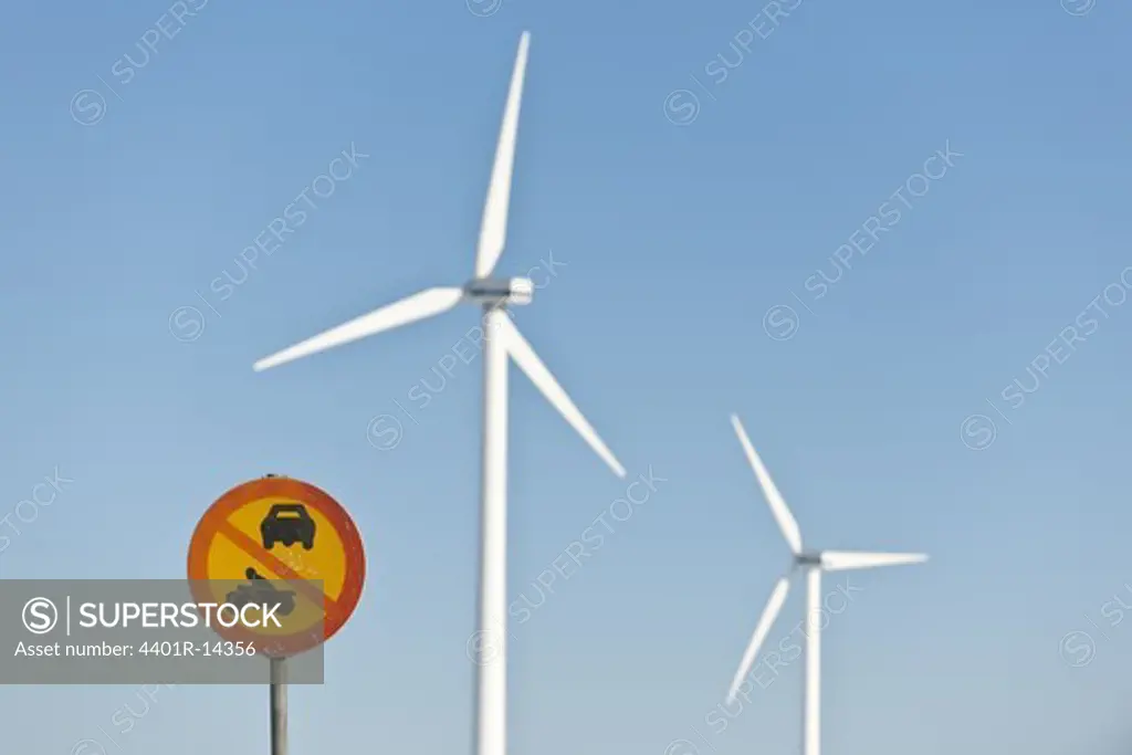 No entry sign and wind turbines