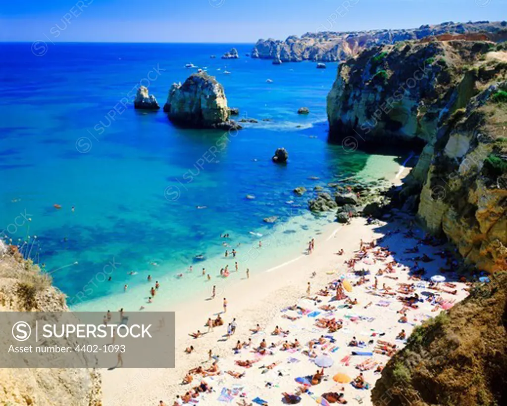 Beach full of holidaymakers, Algarve, Portugal