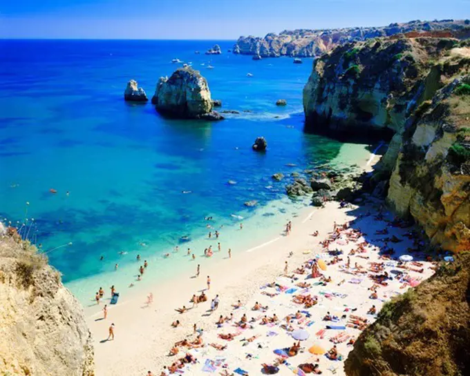 Beach full of holidaymakers, Algarve, Portugal