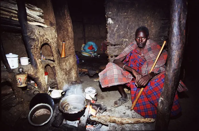 Maasai man in traditional house, Kenya