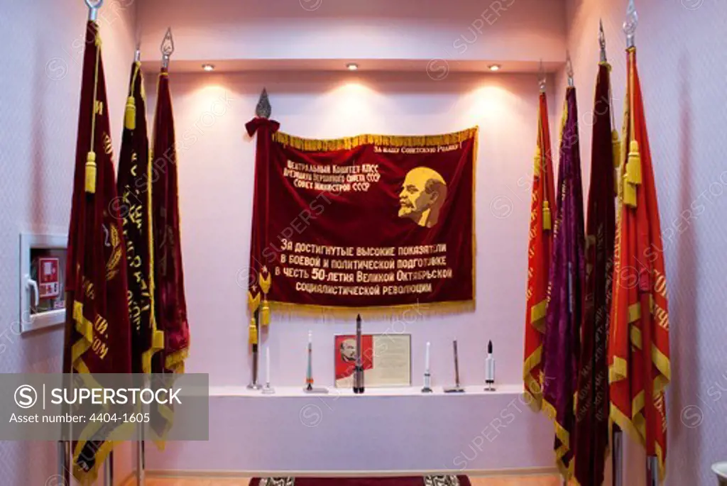 Lenin commemorative flag and rocket display in a museum, Baikonur Space Museum, Baikonur Cosmodrome, Kazakhstan