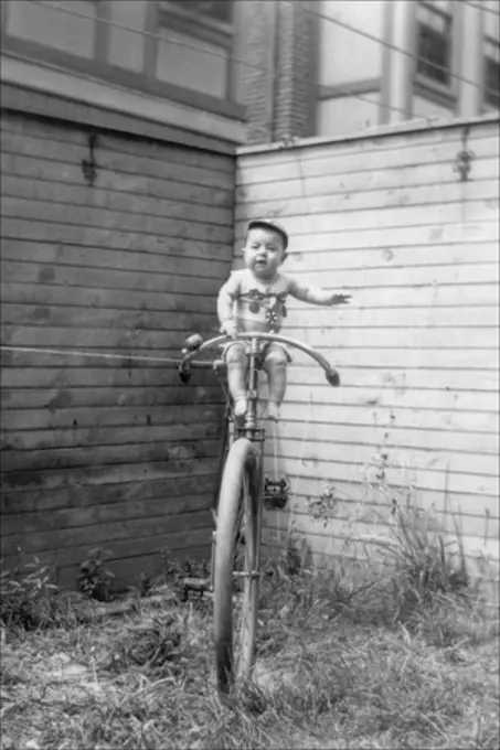 Baby on Unicycle, Classic Photography