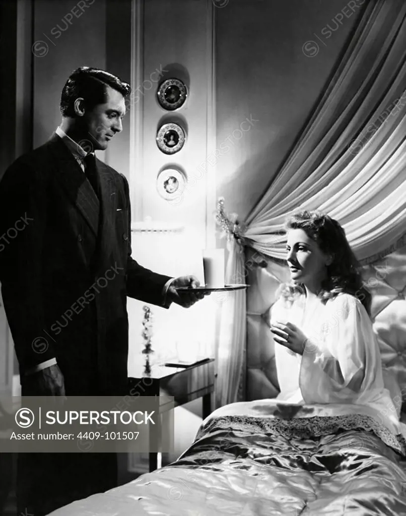 CARY GRANT and JOAN FONTAINE in SUSPICION (1941), directed by ALFRED HITCHCOCK.