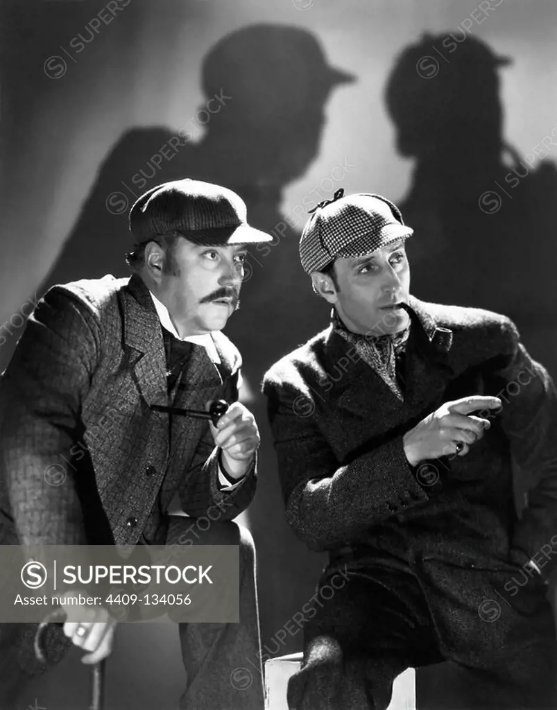 BASIL RATHBONE and NIGEL BRUCE in THE HOUND OF THE BASKERVILLES