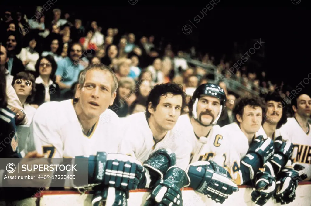 PAUL NEWMAN and MICHAEL ONTKEAN in SLAP SHOT (1977), directed by GEORGE ROY HILL.