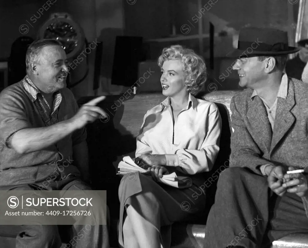 JOSEPH COTTEN, MARILYN MONROE and HENRY HATHAWAY in NIAGARA (1953), directed by HENRY HATHAWAY.